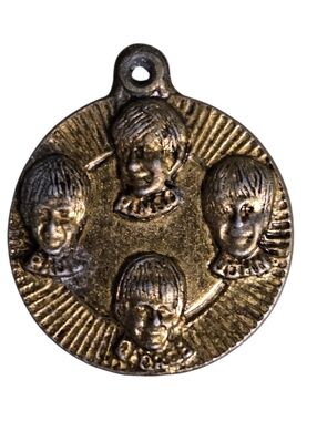 Vintage Beatles Brass Charm Features Raised Relief Faces 1965